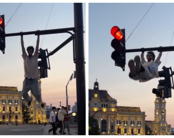 Cascadorie periculoasă pe semafor în Oradea. Polițiștii nu l-au identificat pe „maimuțoiul” acrobat, suspectat că a folosit inteligența artificială pentru postare